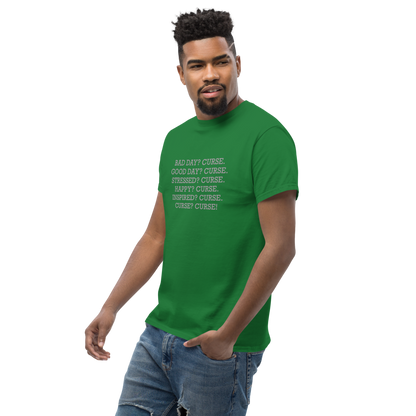 "Bad Day? Curse. Good Day? Curse. Stressed? Curse. Happy? Curse. Inspired? Curse. Curse? Curse!" printed on a turf green unisex classic tee worn by a male