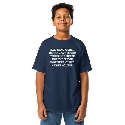 "Bad Day? Curse. Good Day? Curse. Stressed? Curse. Happy? Curse. Inspired? Curse. Curse? Curse!" printed on a navy youth classic tee worn by a male