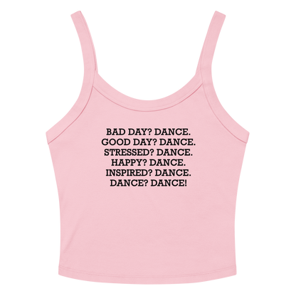 "Bad Day? Dance. Good Day? Dance. Stressed? Dance. Happy? Dance. Inspired? Dance. Dance? Dance!" printed on a solid pink blend women's micro-rib tanktop laying on a flat surface amongst sunglasses and shorts