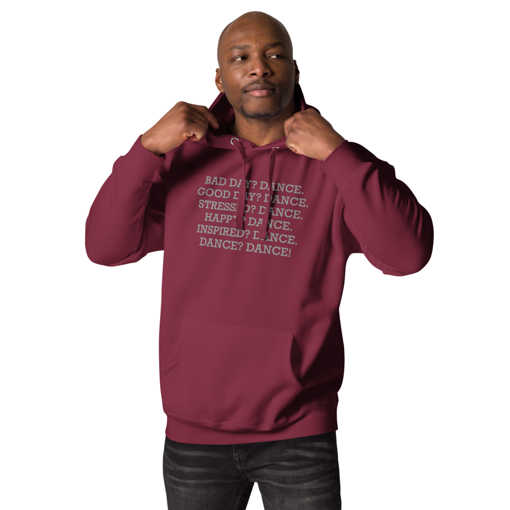 "Bad Day? Dance. Good Day? Dance. Stressed? Dance. Happy? Dance. Inspired? Dance. Dance? Dance!" printed on a maroon unisex hoodie worn by a male