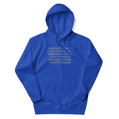 "Bad Day? Dance. Good Day? Dance. Stressed? Dance. Happy? Dance. Inspired? Dance. Dance? Dance!" printed on a team royal unisex hoodie laying on a flat surface with the hood up
