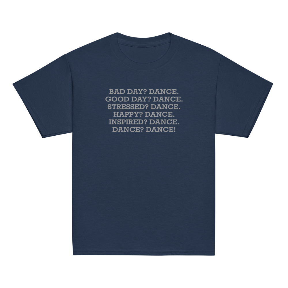 "Bad Day? Dance. Good Day? Dance. Stressed? Dance. Happy? Dance. Inspired? Dance. Dance? Dance!" printed on a navy youth classic tee laying on a flat surface