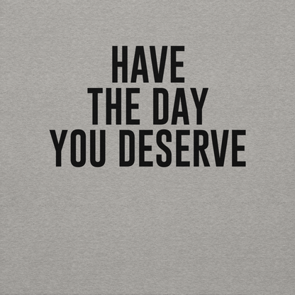 "Have the day you deserve" printed on a carbon grey background
