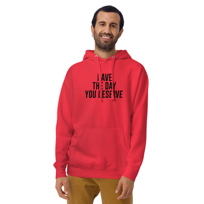 "Have the day you deserve" printed on a team red warn by a male