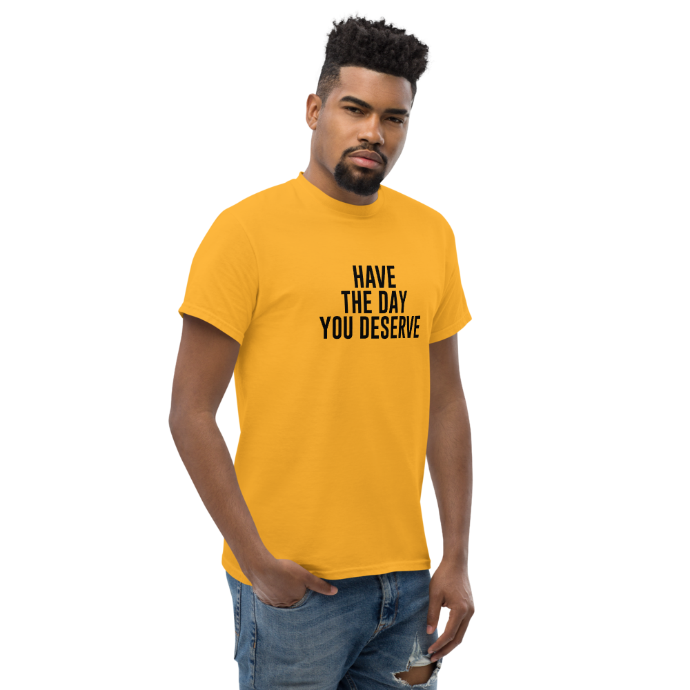 "Have the day you deserve" printed on a gold unisex classic tee worn by a male