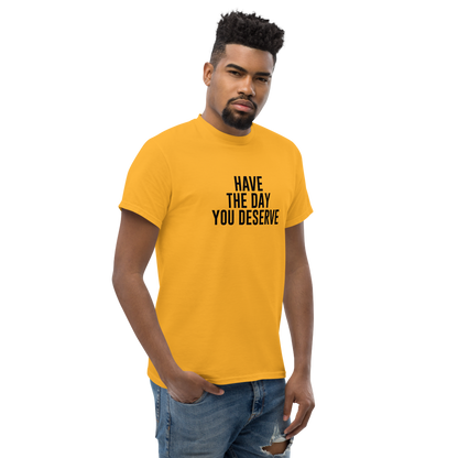 "Have the day you deserve" printed on a gold unisex classic tee worn by a male