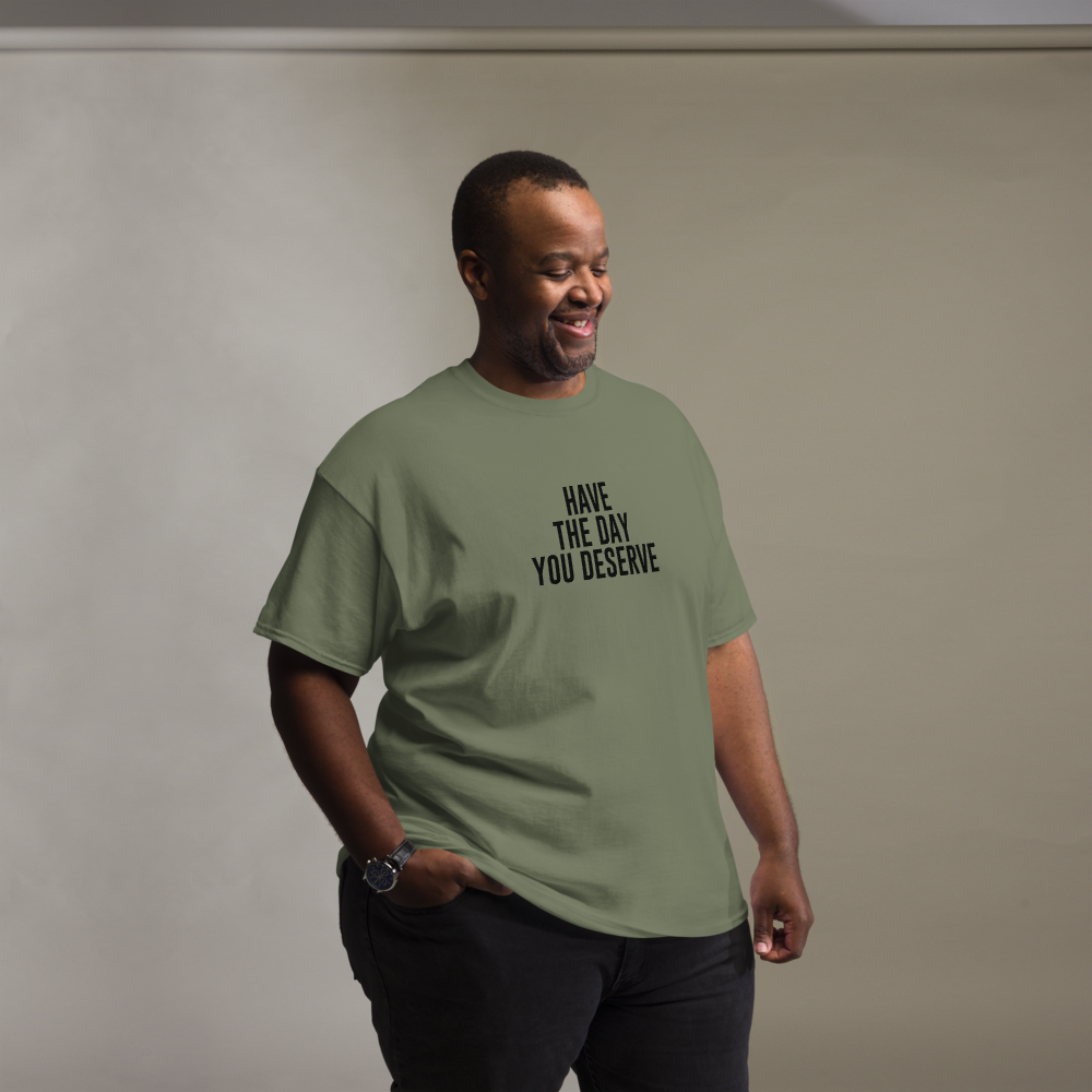 "Have the day you deserve" printed on a military green unisex classic tee worn by a male