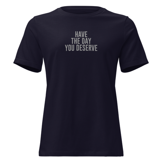 "Have the day you deserve" printed on a navy on an invisible / simulated body