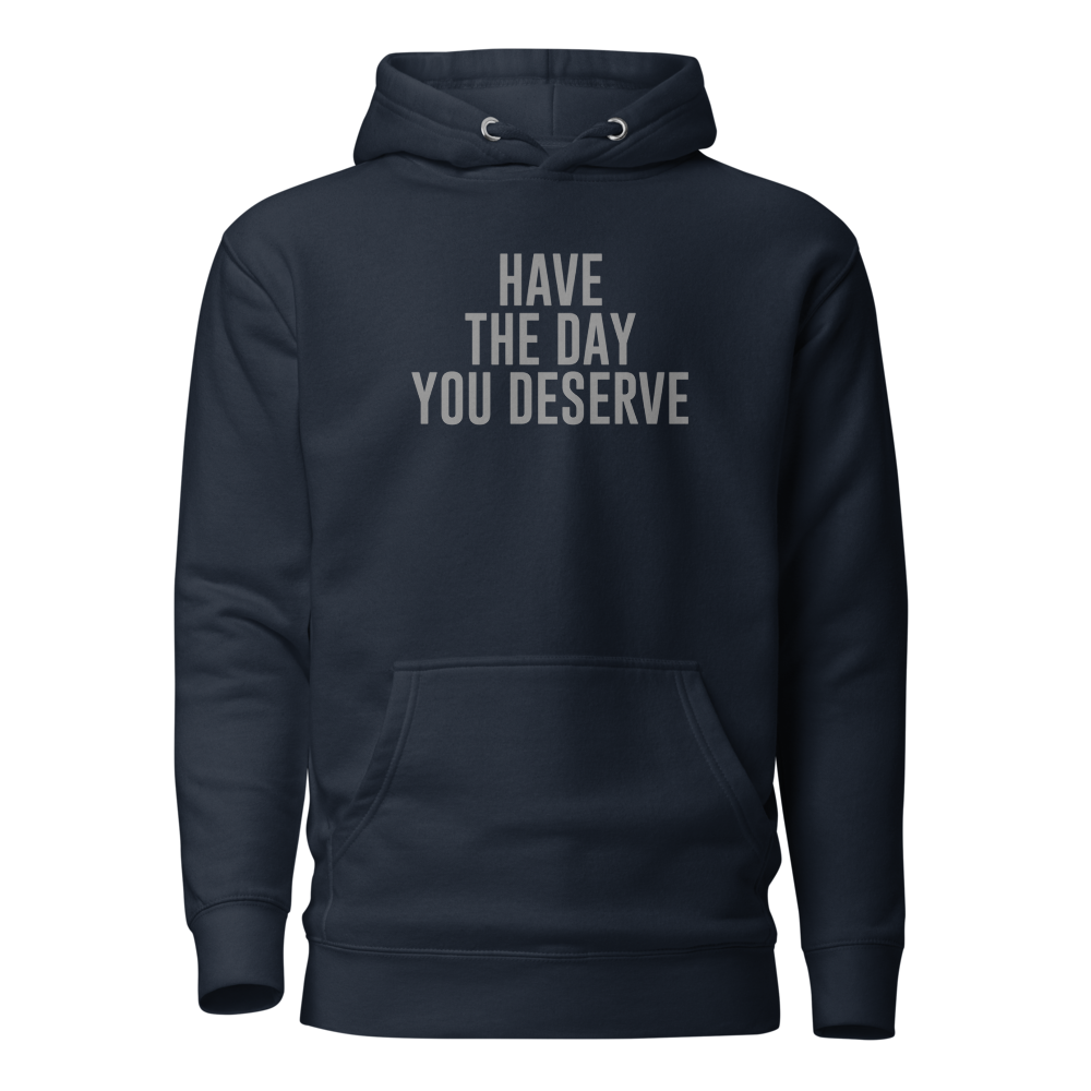"Have the day you deserve" printed on a navy blazer on an invisible / simulated body