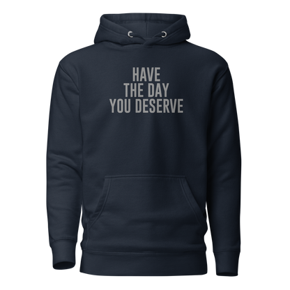 "Have the day you deserve" printed on a navy blazer on an invisible / simulated body
