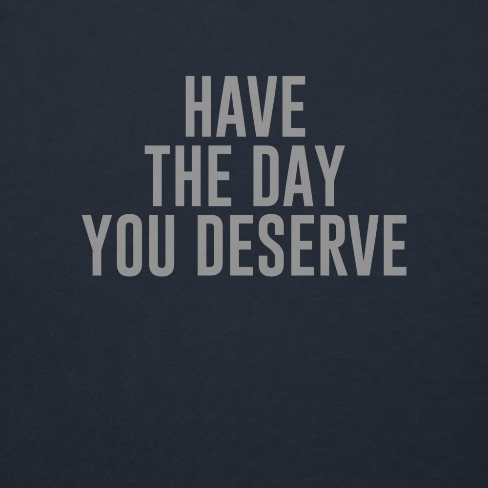 "Have the day you deserve" printed on a navy blazer background