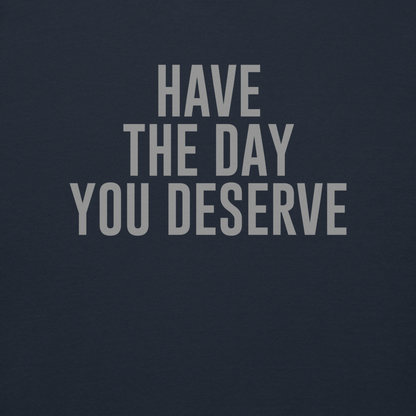 "Have the day you deserve" printed on a navy blazer background