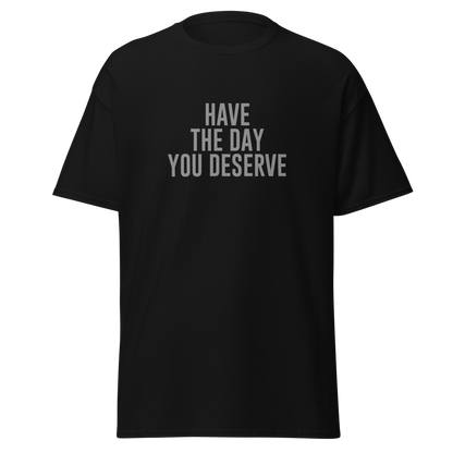 "Have the day you deserve" printed on a black on an invisible body