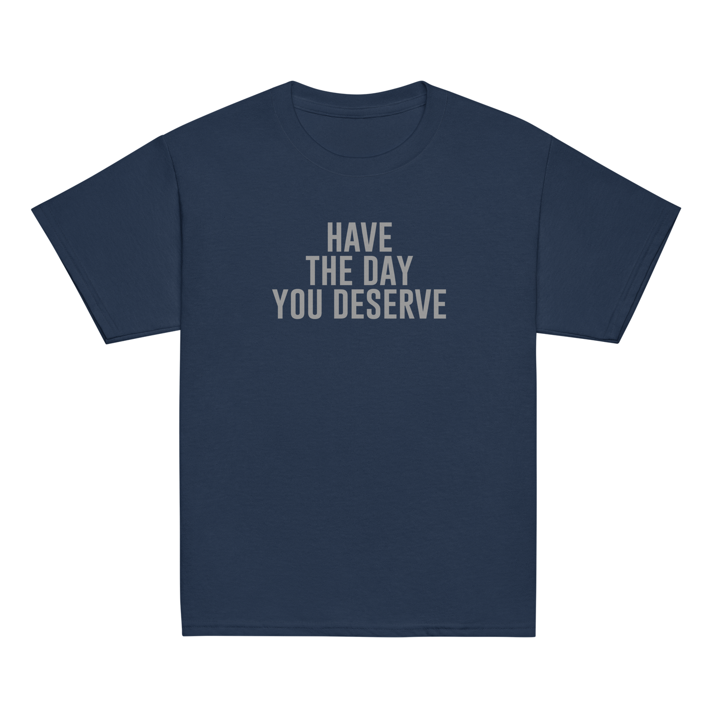 "Have the day you deserve" printed on a navy youth classic tee laying on a flat surface