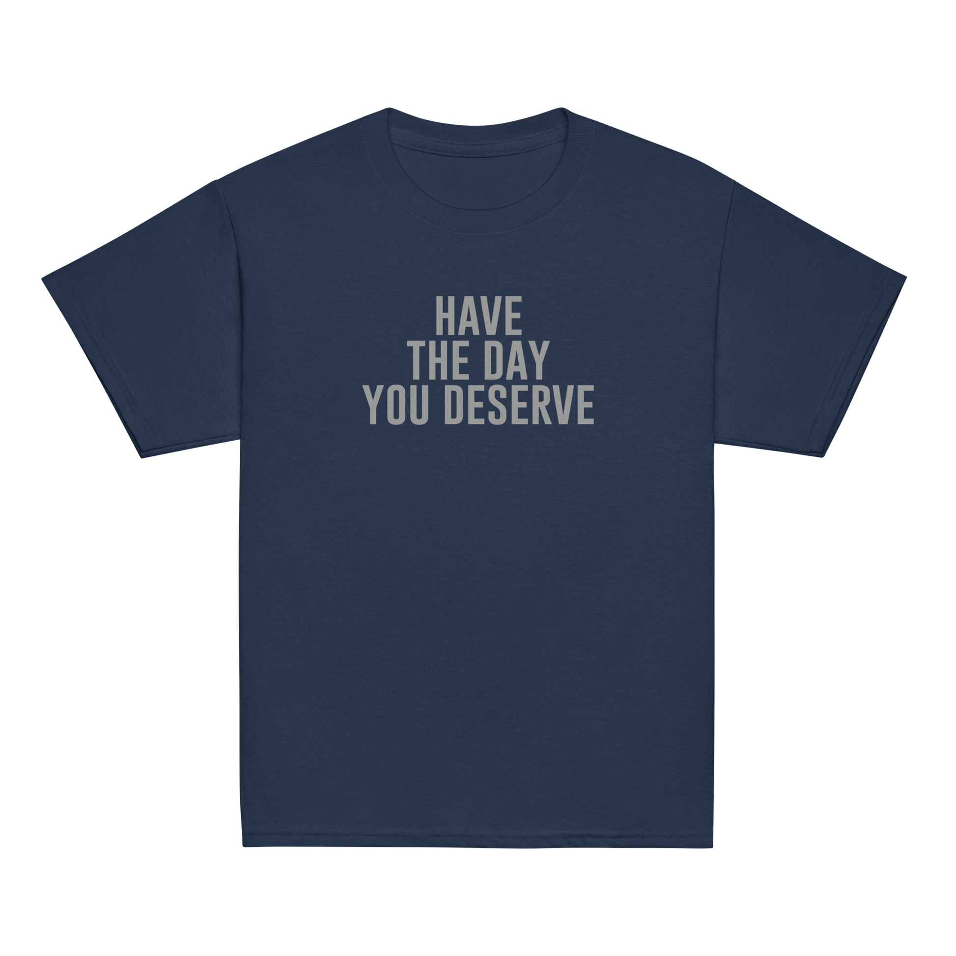 "Have the day you deserve" printed on a navy youth classic tee laying on a flat surface