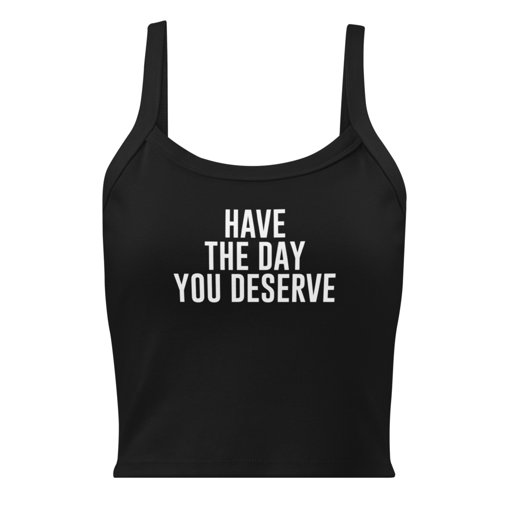 "Have the day you deserve" printed on a solid black blend women's micro-rib tanktop laying on a flat surface