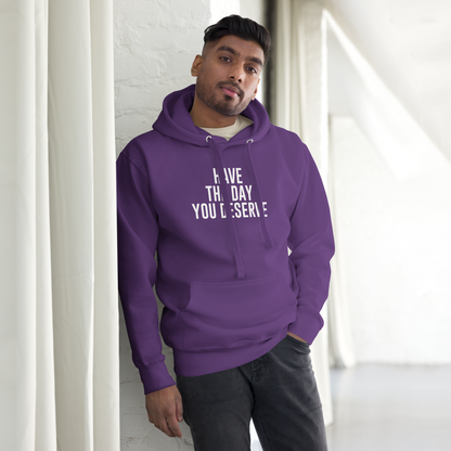 "Have the day you deserve" printed on a purple unisex hoodie worn by a male