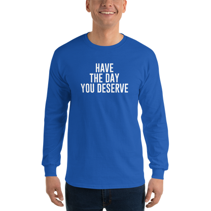 "Have the day you deserve" printed on a royal men's long sleeve shirt worn by a male