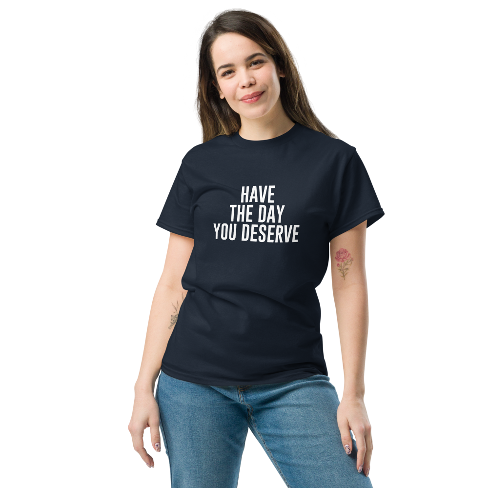 "Have the day you deserve" printed on a navy unisex classic tee worn by a female