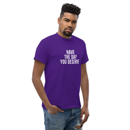 "Have the day you deserve" printed on a purple unisex classic tee worn by a male
