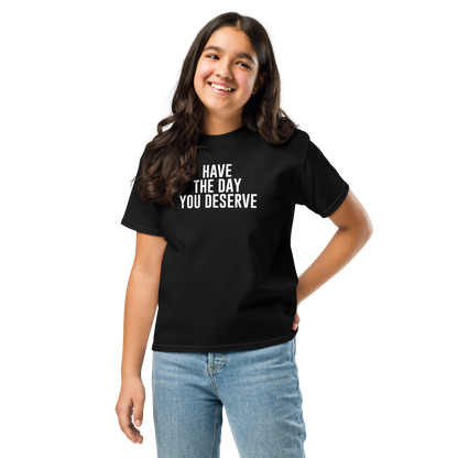 "Have the day you deserve" printed on a black youth classic tee worn by a female