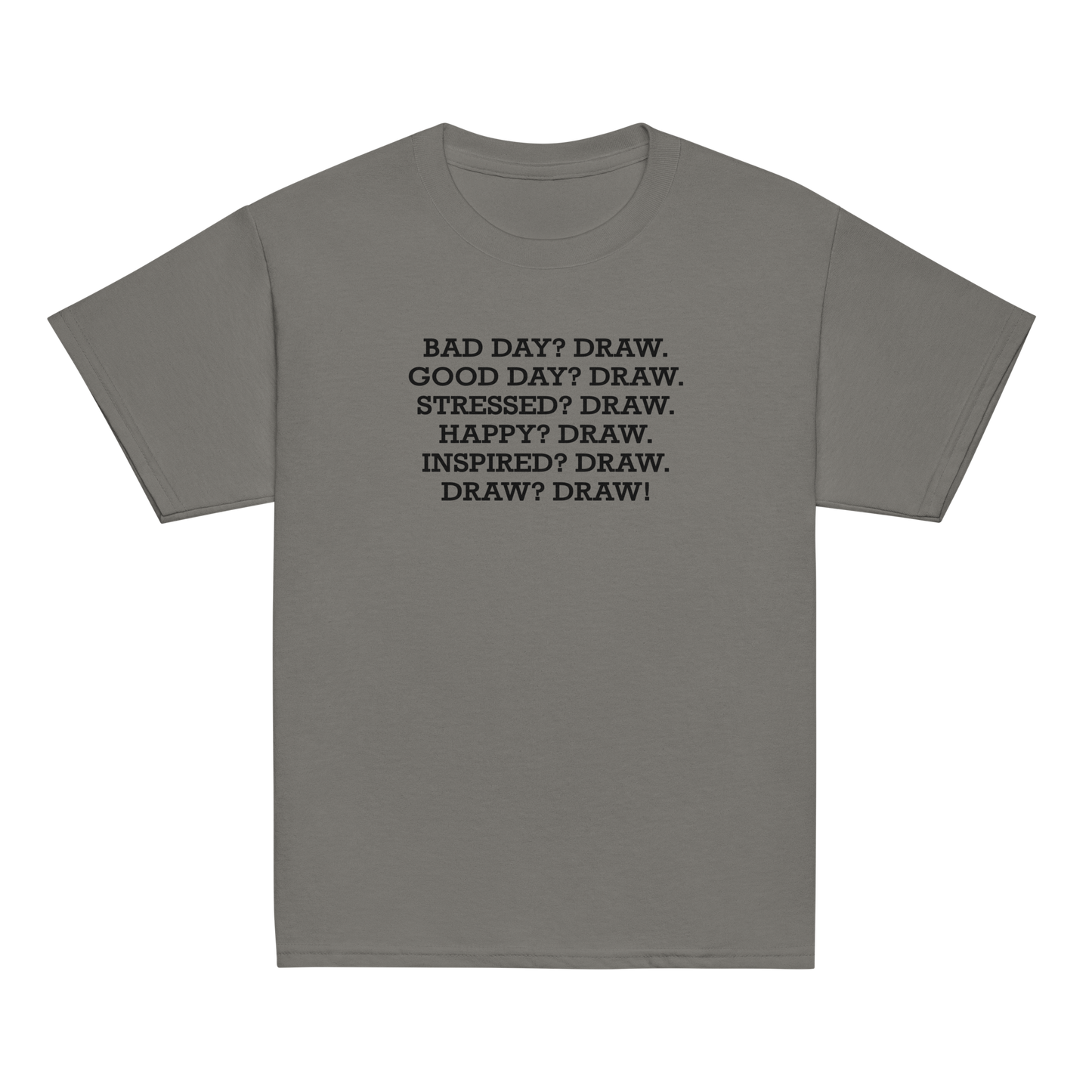 "Bad Day? Draw. Good Day? Draw. Stressed? Draw. Happy? Draw. Inspired? Draw. Draw? Draw!" printed on a charcoal youth classic tee laying on a flat surface