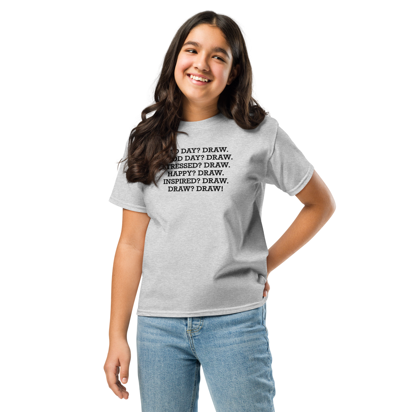 "Bad Day? Draw. Good Day? Draw. Stressed? Draw. Happy? Draw. Inspired? Draw. Draw? Draw!" printed on a sport grey youth classic tee worn by a female