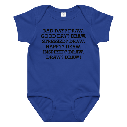 "Bad Day? Draw. Good Day? Draw. Stressed? Draw. Happy? Draw. Inspired? Draw. Draw? Draw!" printed on a royal baby jersey bodysuit laying on a flat surface amongst other clothes
