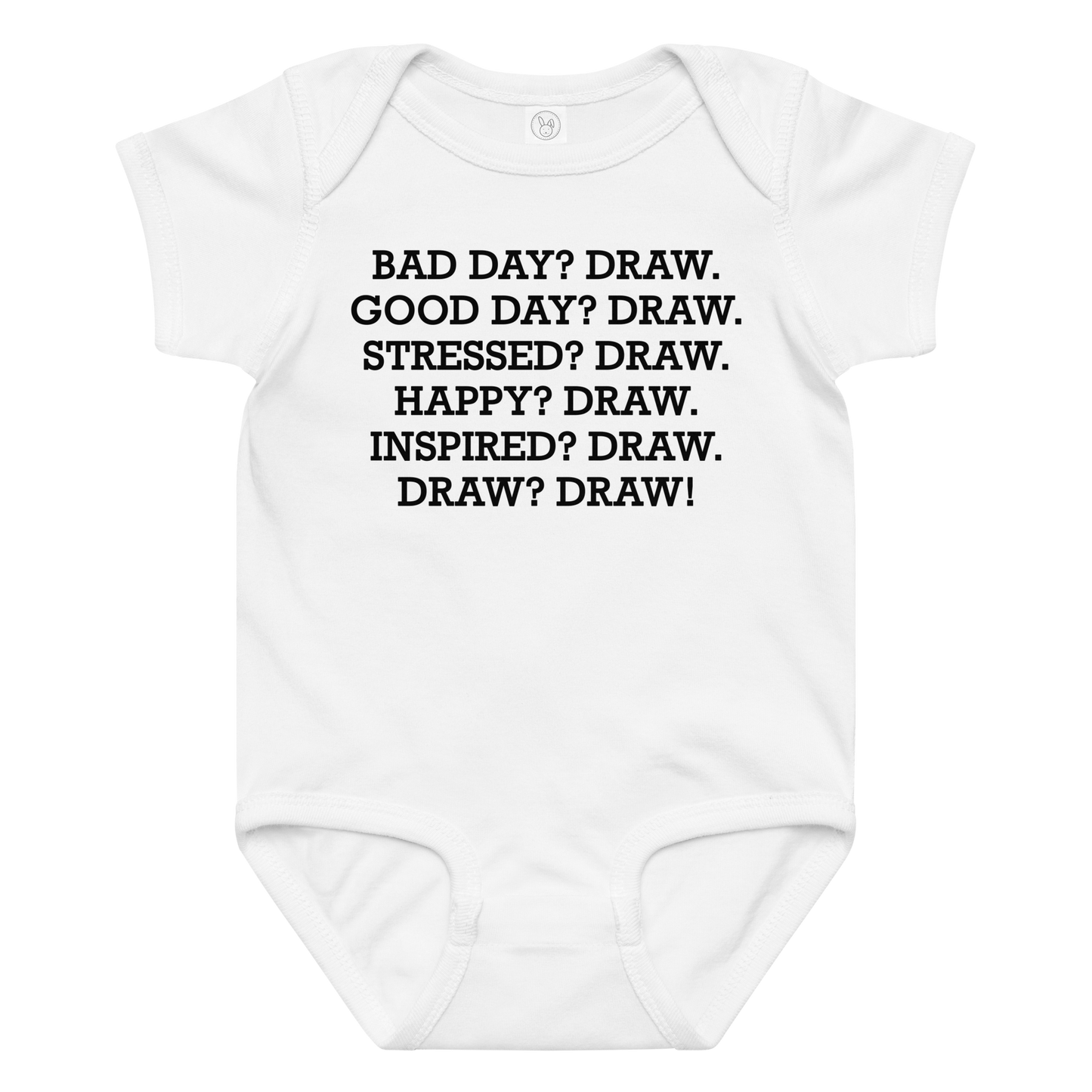 "Bad Day? Draw. Good Day? Draw. Stressed? Draw. Happy? Draw. Inspired? Draw. Draw? Draw!" printed on a white baby jersey bodysuit laying on a flat surface amongst other clothes