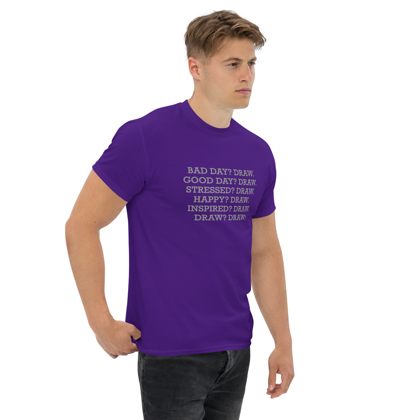 "Bad Day? Draw. Good Day? Draw. Stressed? Draw. Happy? Draw. Inspired? Draw. Draw? Draw!" printed on a purple unisex classic tee worn by a male