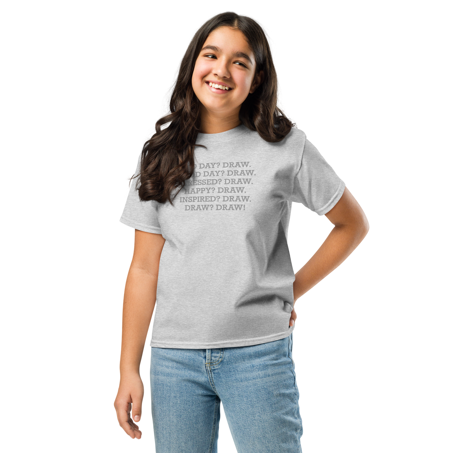 "Bad Day? Draw. Good Day? Draw. Stressed? Draw. Happy? Draw. Inspired? Draw. Draw? Draw!" printed on a sport grey youth classic tee worn by a female