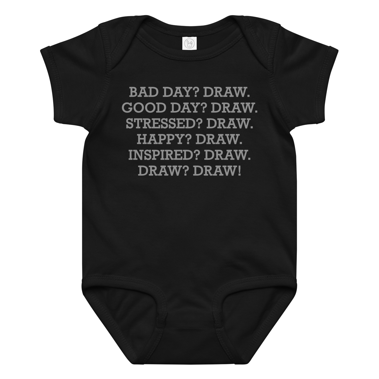 "Bad Day? Draw. Good Day? Draw. Stressed? Draw. Happy? Draw. Inspired? Draw. Draw? Draw!" printed on a black baby jersey bodysuit laying on a flat surface amongst other clothes