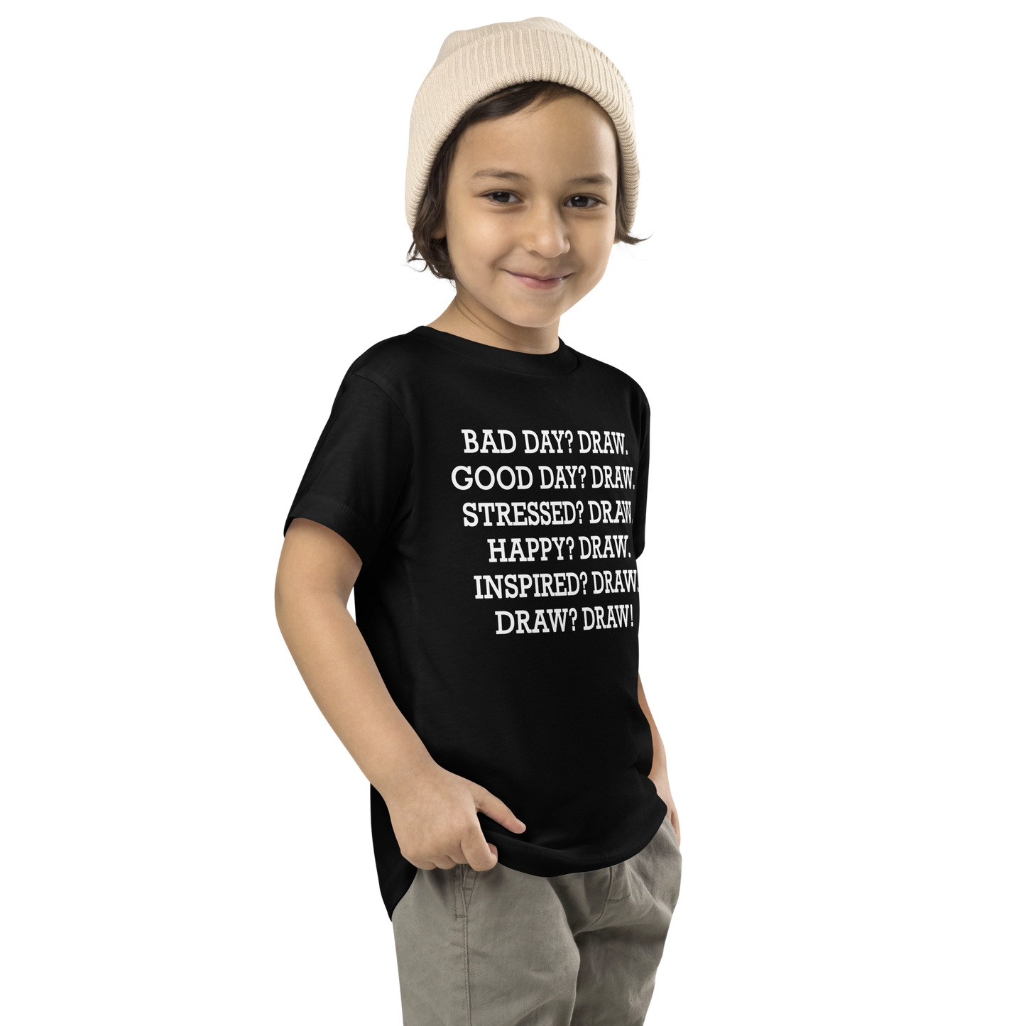 "Bad Day? Draw. Good Day? Draw. Stressed? Draw. Happy? Draw. Inspired? Draw. Draw? Draw!" printed on a black toddler short sleeve tee worn by a male who is also wearing a knit cap