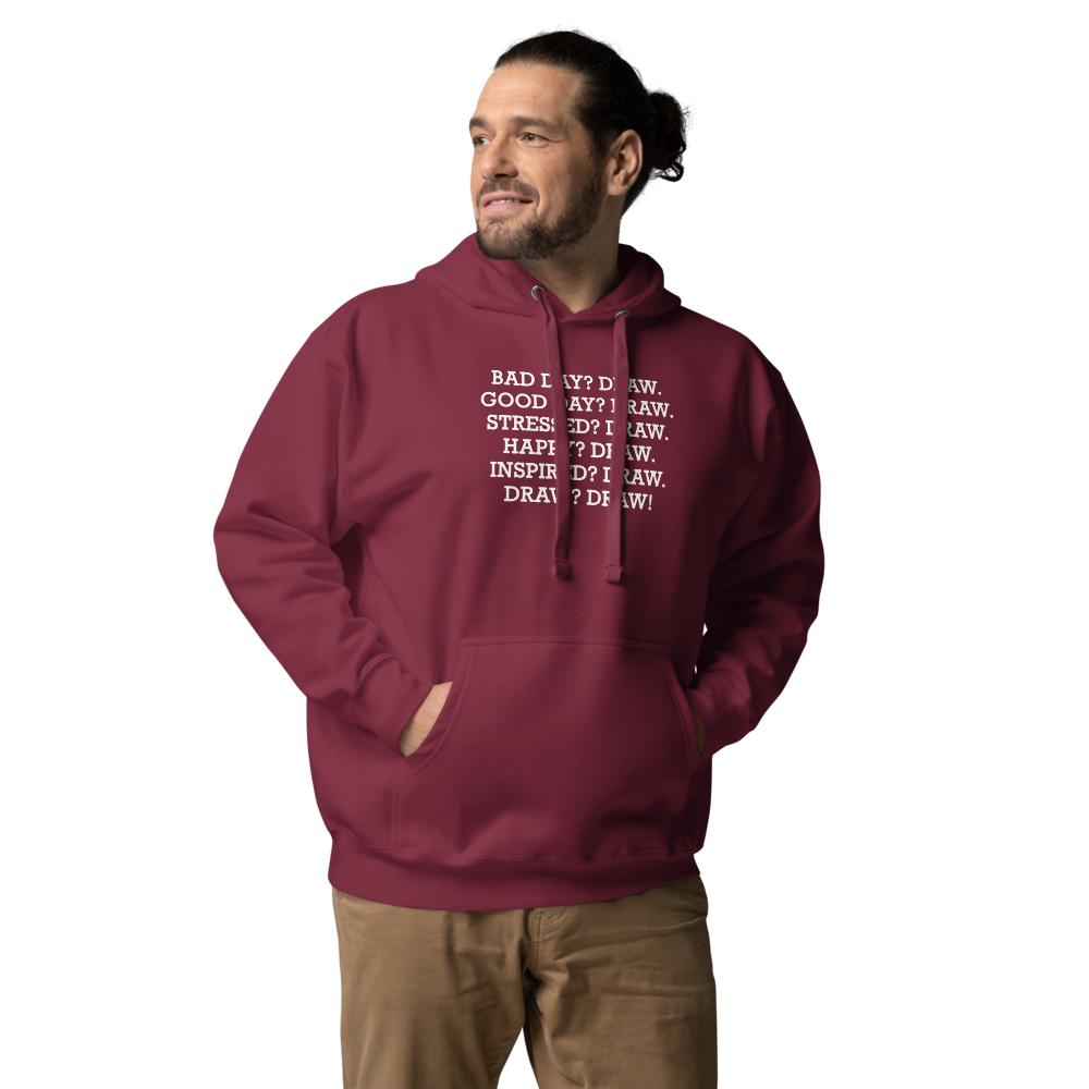 "Bad Day? Draw. Good Day? Draw. Stressed? Draw. Happy? Draw. Inspired? Draw. Draw? Draw!" printed on a maroon unisex hoodie worn by a male