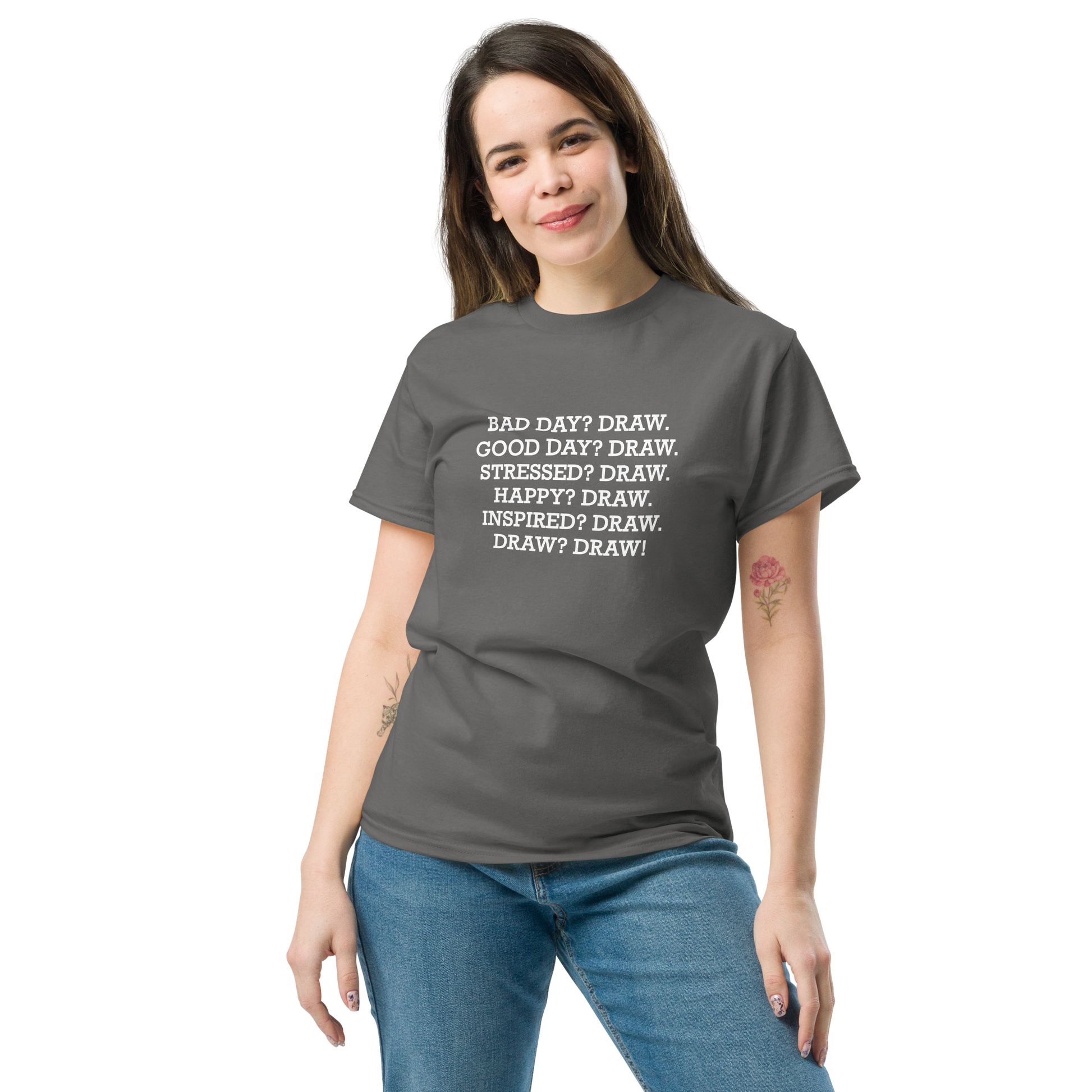 "Bad Day? Draw. Good Day? Draw. Stressed? Draw. Happy? Draw. Inspired? Draw. Draw? Draw!" printed on a charcoal unisex classic tee worn by a female