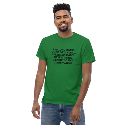 "Bad Day? Game. Good Day? Game. Stressed? Game. Happy? Game. Inspired? Game. Game? Game!" printed on a turf green unisex classic tee worn by a male