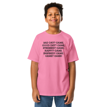 "Bad Day? Game. Good Day? Game. Stressed? Game. Happy? Game. Inspired? Game. Game? Game!" printed on a azalea youth classic tee worn by a male