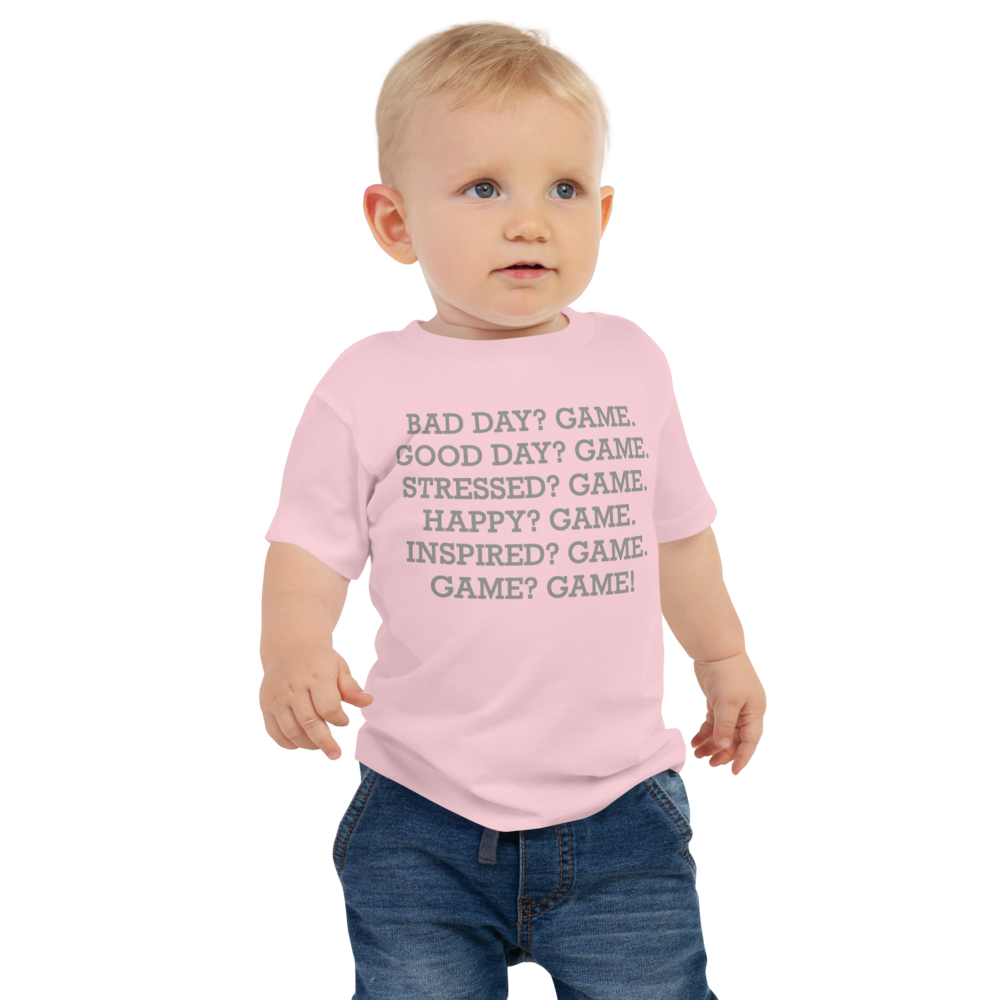 "Bad Day? Game. Good Day? Game. Stressed? Game. Happy? Game. Inspired? Game. Game? Game!" printed on a pink baby jersey short sleeve tee worn by a male