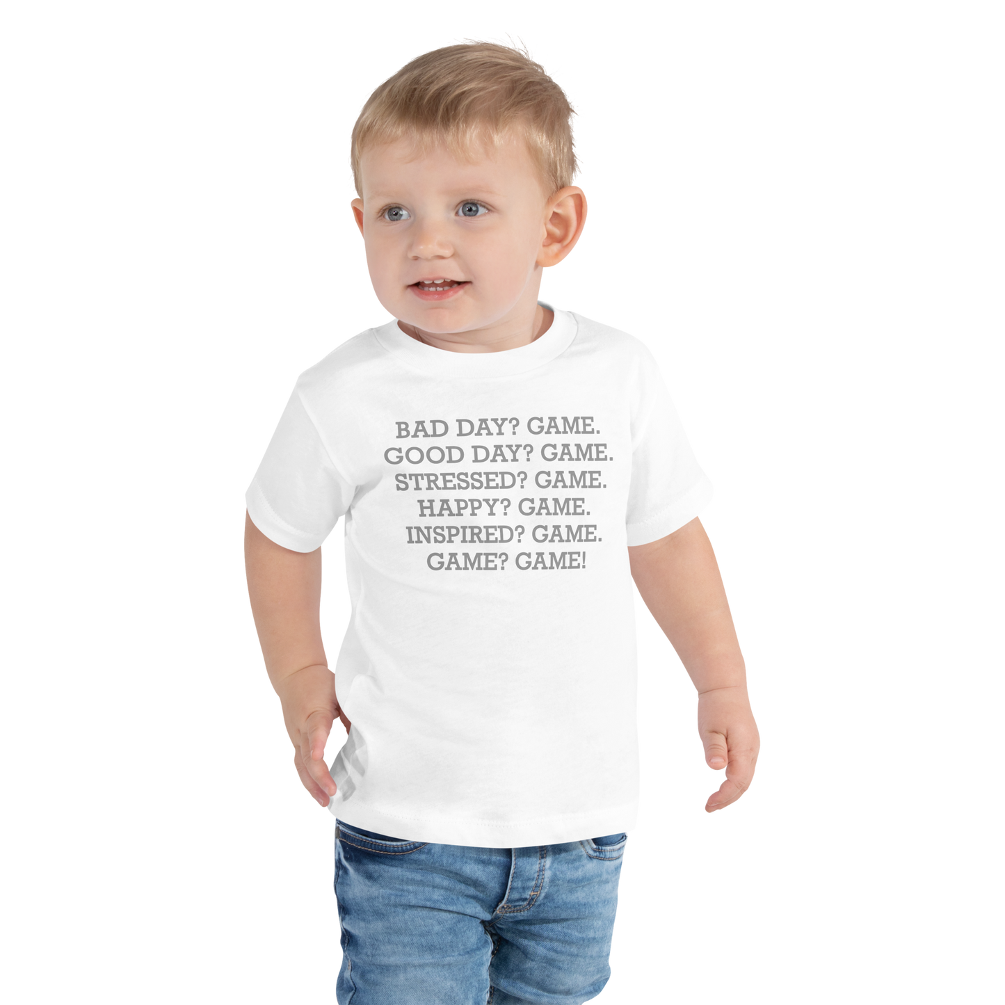 "Bad Day? Game. Good Day? Game. Stressed? Game. Happy? Game. Inspired? Game. Game? Game!" printed on a white toddler short sleeve tee worn by a male