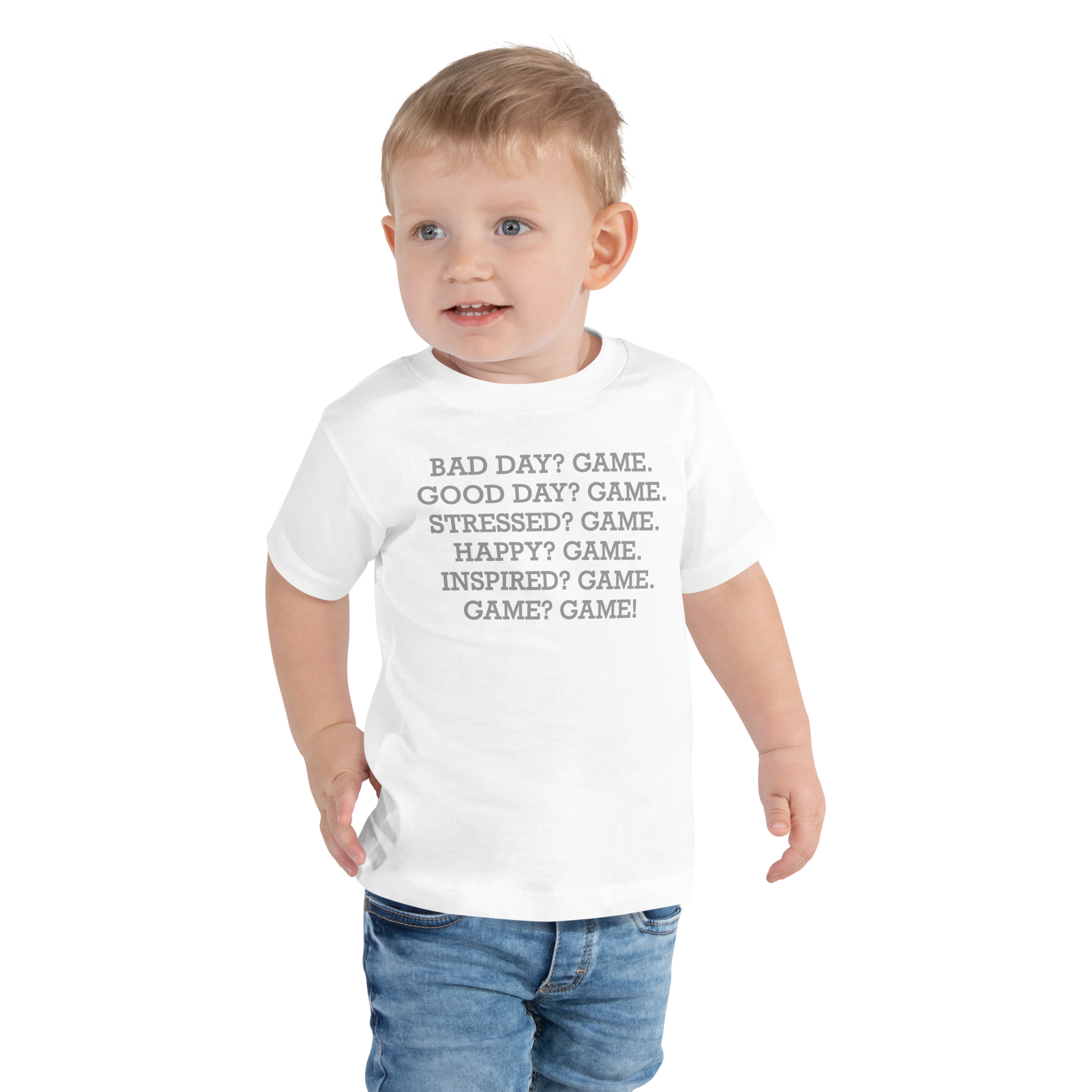"Bad Day? Game. Good Day? Game. Stressed? Game. Happy? Game. Inspired? Game. Game? Game!" printed on a white toddler short sleeve tee worn by a male