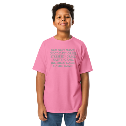 "Bad Day? Game. Good Day? Game. Stressed? Game. Happy? Game. Inspired? Game. Game? Game!" printed on a azalea youth classic tee worn by a male