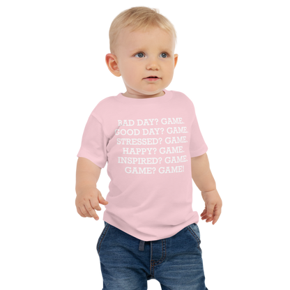 "Bad Day? Game. Good Day? Game. Stressed? Game. Happy? Game. Inspired? Game. Game? Game!" printed on a pink baby jersey short sleeve tee worn by a male