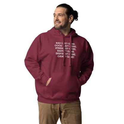 "Bad Day? Game. Good Day? Game. Stressed? Game. Happy? Game. Inspired? Game. Game? Game!" printed on a maroon unisex hoodie worn by a male