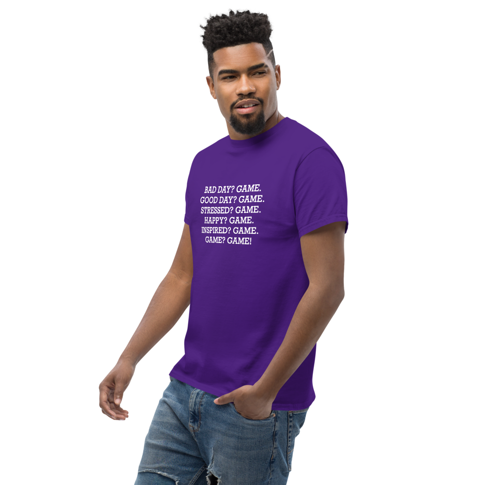 "Bad Day? Game. Good Day? Game. Stressed? Game. Happy? Game. Inspired? Game. Game? Game!" printed on a purple unisex classic tee worn by a male