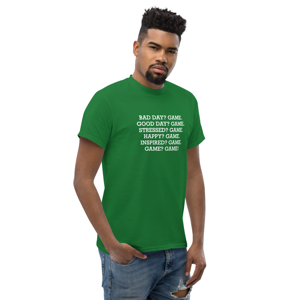 "Bad Day? Game. Good Day? Game. Stressed? Game. Happy? Game. Inspired? Game. Game? Game!" printed on a turf green unisex classic tee worn by a male