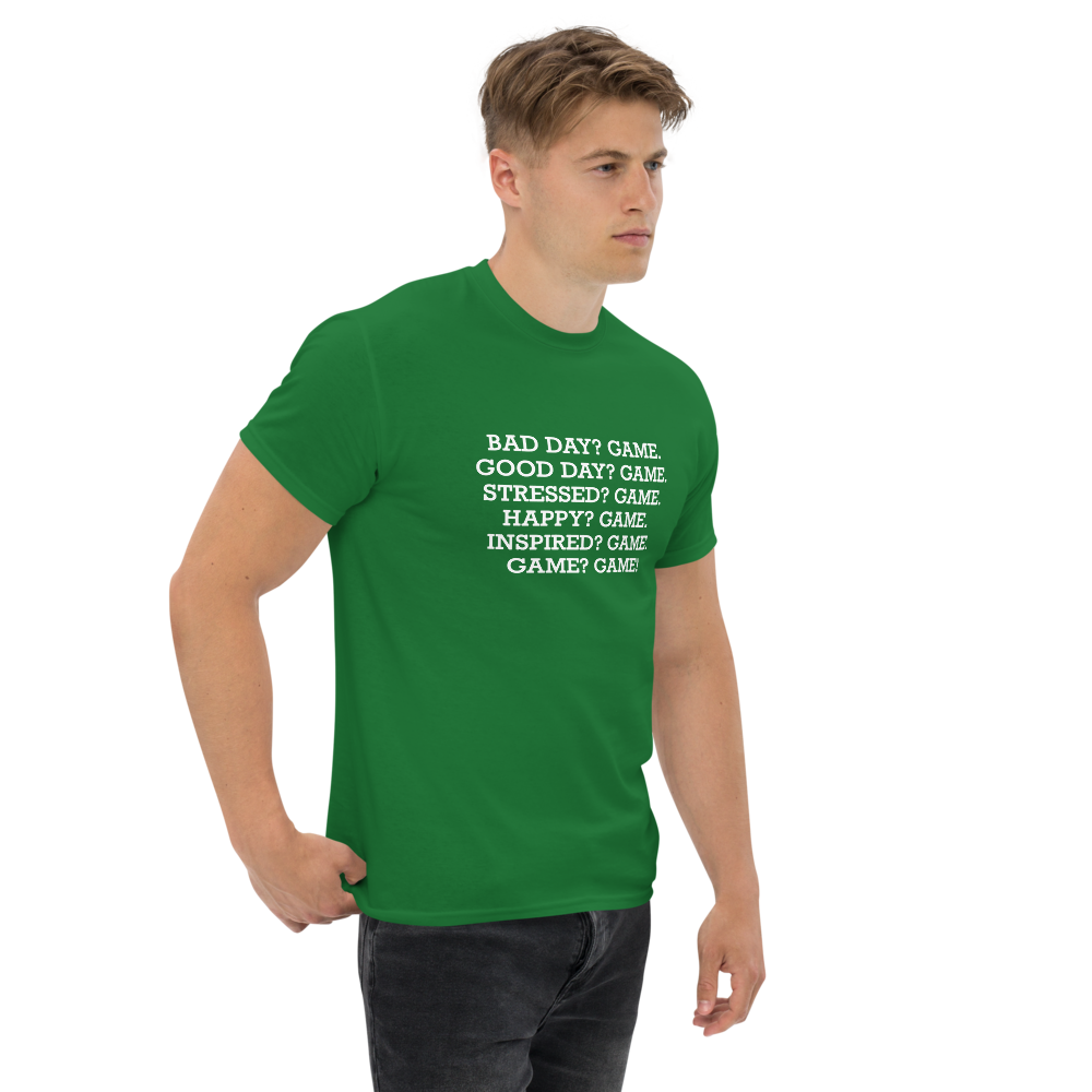 "Bad Day? Game. Good Day? Game. Stressed? Game. Happy? Game. Inspired? Game. Game? Game!" printed on a turf green unisex classic tee worn by a male