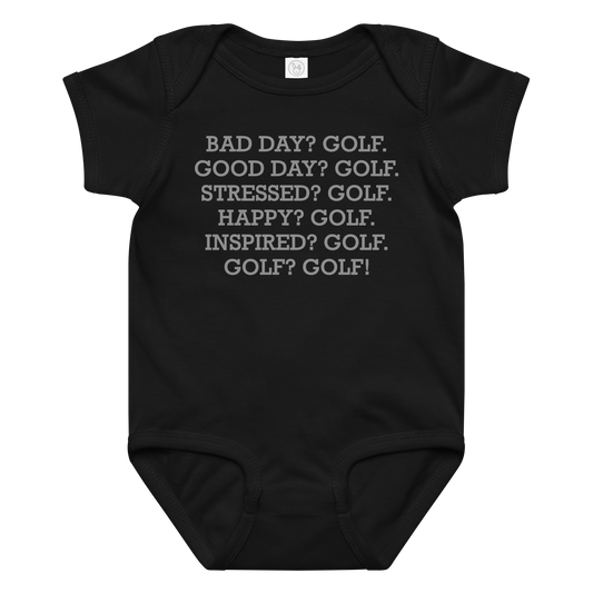 "Bad Day? Golf. Good Day? Golf. Stressed? Golf. Happy? Golf. Inspired? Golf. Golf? Golf!" printed on a black baby jersey bodysuit laying on a flat surface amongst other clothes