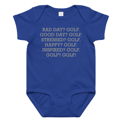 "Bad Day? Golf. Good Day? Golf. Stressed? Golf. Happy? Golf. Inspired? Golf. Golf? Golf!" printed on a royal baby jersey bodysuit laying on a flat surface amongst other clothes