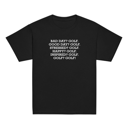 "Bad Day? Golf. Good Day? Golf. Stressed? Golf. Happy? Golf. Inspired? Golf. Golf? Golf!" printed on a black youth classic tee laying on a flat surface