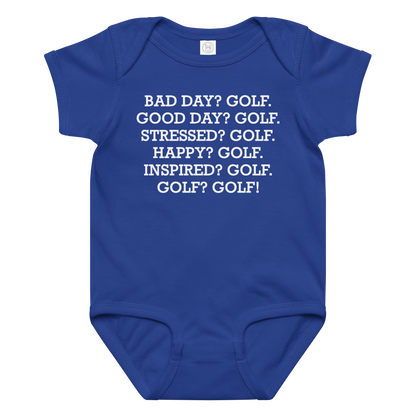 "Bad Day? Golf. Good Day? Golf. Stressed? Golf. Happy? Golf. Inspired? Golf. Golf? Golf!" printed on a royal baby jersey bodysuit laying on a flat surface amongst other clothes